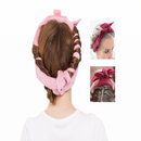 Pink hair roller with bow on a white background